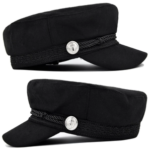 Detailed side view of black wool fiddler cap with woven rope and anchor metal buttons