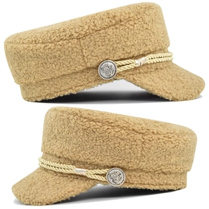 Detail of camel wool baker boy hat with braided gold rope and embossed metal button
