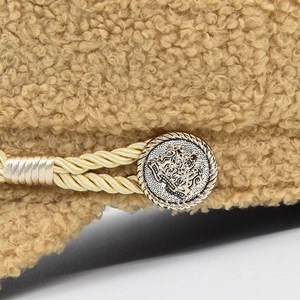 Beige faux fur baker boy hat for women with gold braided rope and vintage metal button