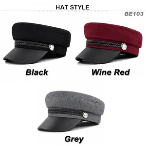 Stylish women's wool newsboy caps in black, wine red, and grey with metallic buttons