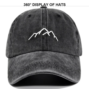 Detailed close-up of 3D mountain embroidery on a charcoal grey vintage baseball cap