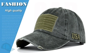 Detail of distressed baseball cap with USA embroidery and American flag patch on washed fabric