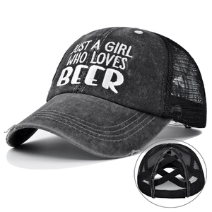Distressed black ponytail baseball cap with Just A Girl Who Loves Beer white embroidery