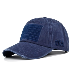 Distressed dark blue baseball cap with USA embroidery and hook and loop patch design