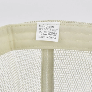 Detail view of the interior care label showing 65% cotton and 35% polyester fabric blend