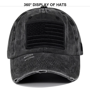 Detail of washed grey baseball cap featuring a black US flag patch and distressed brim