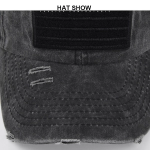 Detailed close-up of distressed cotton denim baseball cap with velcro patch section
