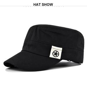 Detailed side view of black military flat top hat featuring a star logo fabric patch
