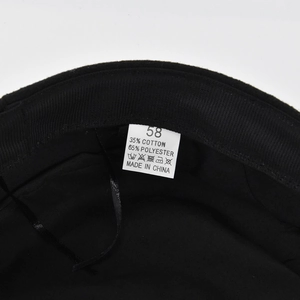 Vue détaillée de la doublure avec étiquette de taille 58 et mélange 35% coton