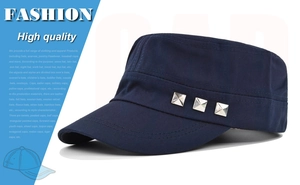 Detail of navy cotton cadet cap featuring silver square metal studs and neat stitching