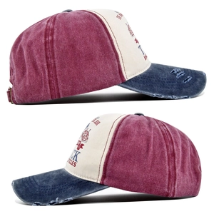 Detalle de gorra de béisbol vintage lavada con bordes desgastados y bordados