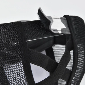 Detail of black mesh baseball cap showing criss-cross elastic bands for high ponytail styles