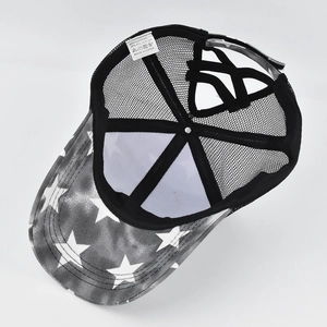 Detail of internal lining and material composition tag for embroidery ponytail baseball cap