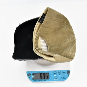 Detailed view showing the 80.5g lightweight weight of the washed graffiti baseball cap
