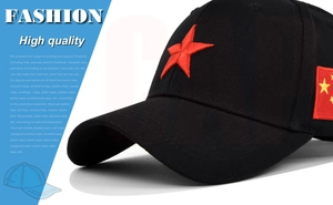 Detailed close-up of 3D red pentagram star embroidery on a black cotton baseball cap