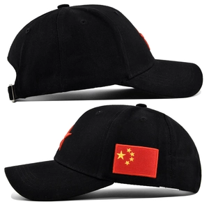 Close-up of black baseball cap featuring 3D star embroidery and adjustable metal buckle