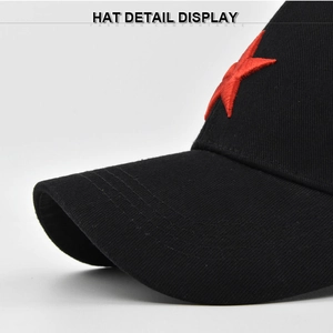 Detail display of 3D red star embroidery on black cotton twill baseball cap