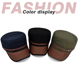 Flat top military caps in navy, black, and olive with brown leather brims and metal studs