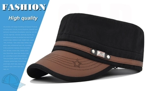 Detail of flat top cap with leather brim, star embroidery, and FS metal badge