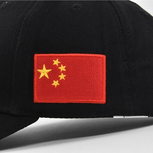 Detailed close-up of 3D star embroidery and high-quality cotton twill texture on a black cap