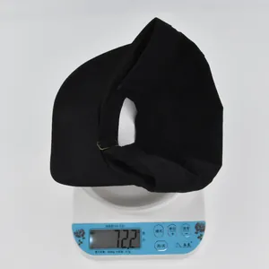 Detailed weight measurement showing black sun visor hat at 72.2g on a scale