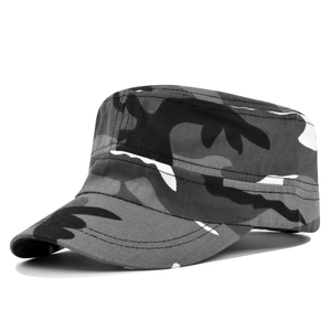 Close-up of grey and white camouflage flat top military cap with sturdy canvas visor