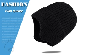 Close-up of black ribbed knit beanie with folded cuff and durable warm texture