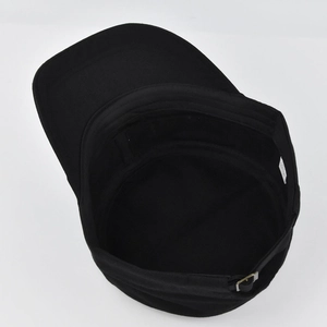 Detail view showing black cotton cadet cap inner lining with metal buckle and laundry label