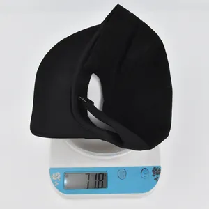 Lightweight black sun visor weighing 71.8g with metal buckle and curved brim