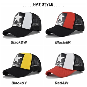 Detail view of four-color patchwork trucker hats with star print and mesh back panels