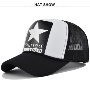 Detail of vintage black and white trucker hat with five-pointed star and mesh back