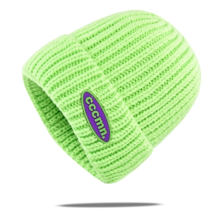 Detail showing high-quality lime green ribbed knit texture and purple logo label