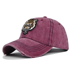Deep red washed canvas baseball cap with 3D tiger embroidery and distressed brim