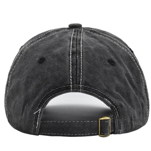 Detail of vintage washed baseball cap back with contrast stitching and metal buckle