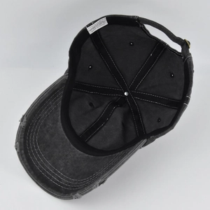Detailed interior of grey washed cotton baseball cap with sweatband and care label