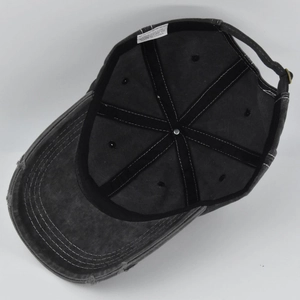 Detail view of cotton washing label and inner stitching on vintage baseball cap