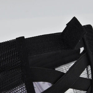 Detail view of black ponytail baseball cap with elastic criss-cross back and velcro closure