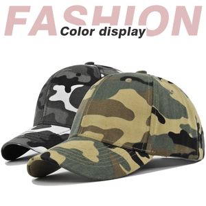 Detail view of children's baseball caps in woodland and urban camouflage patterns