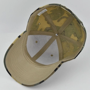 Internal view of camouflage baseball cap showing polyester fabric and structural seams