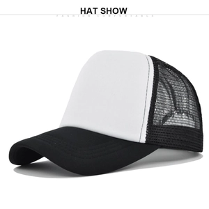 Detailed view of black and white mesh trucker hat with curved brim and breathable back