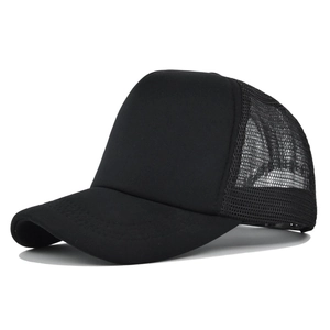 Side view of plain black trucker hat featuring breathable mesh back and solid front panel