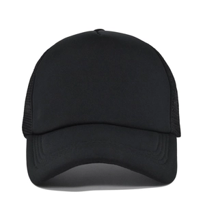 Front view of a plain black trucker hat featuring breathable mesh and a curved brim