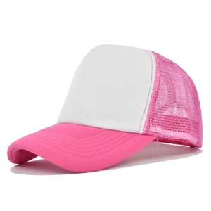 Detail of pink and white trucker hat featuring mesh back and reinforced stitched brim