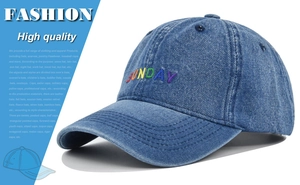 Close-up of multicolor SUNDAY 3D embroidery on washed blue denim baseball cap