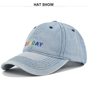 Detail of Sunday 3D rainbow embroidery on blue denim fabric of this baseball cap