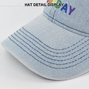 Washed light blue denim baseball cap featuring colorful SUNDAY embroidery and curved brim