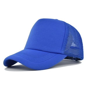 Detailed side view of a blue mesh trucker hat with breathable fabric and curved brim
