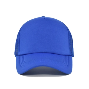 Front detail of bright blue trucker hat featuring foam front panel and breathable mesh