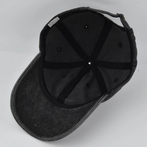 Detailed interior view of a washed cotton baseball cap with cotton label and metal buckle