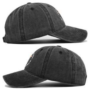 Detail view of the washed cotton fabric texture and vintage embroidery on this baseball cap